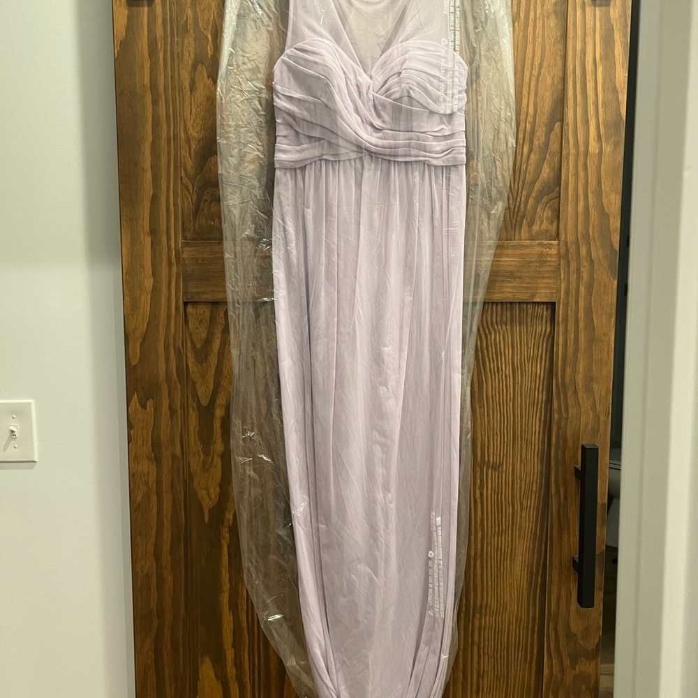 Size 6. Can fit size 8. Worn once for a wedding. Lilac color.